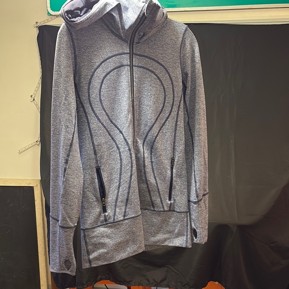 Lululemon Define Hooded Jacket with Zipper and Thumbholes.